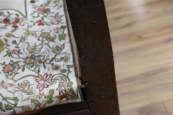 A 17th century carved oak tester bed, W.4ft 6in. H.6ft 1in. L.7ft 2in.